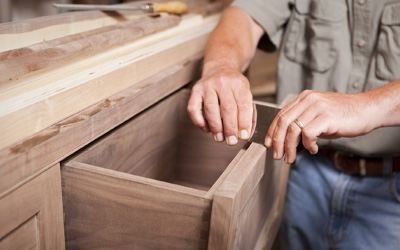 Customized installation & repair of media cabinets, optimizing functionality and aesthetics in your living spaces.