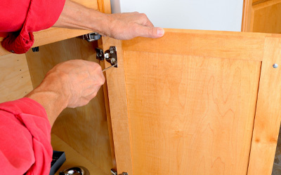 Skillful installation and repair of kitchen cabinets, optimizing storage and style in your kitchen by enhancing space.